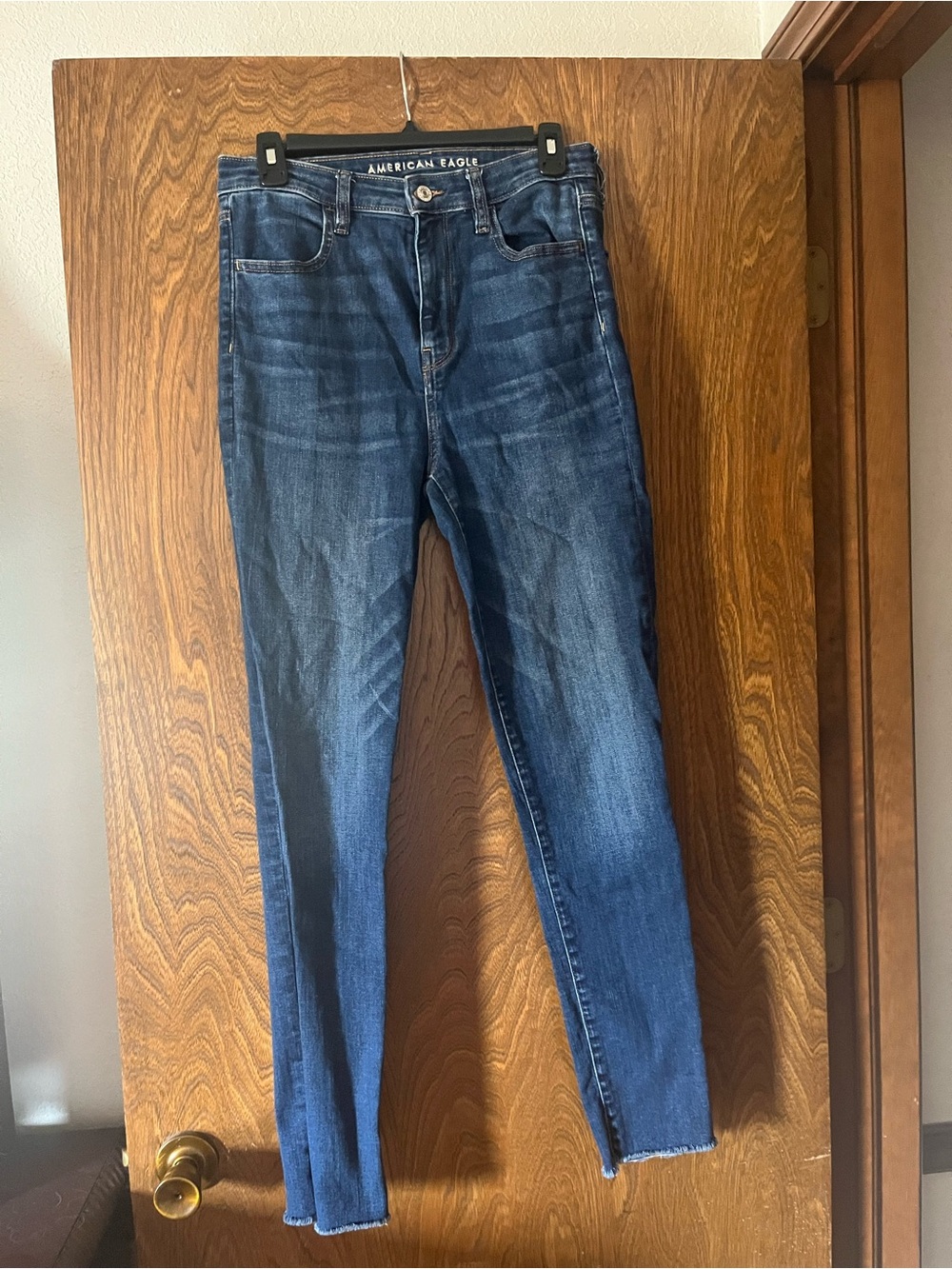 American Eagle Outfitters Medium Blue Stretch Jeans - Mid Wash Raw Hem